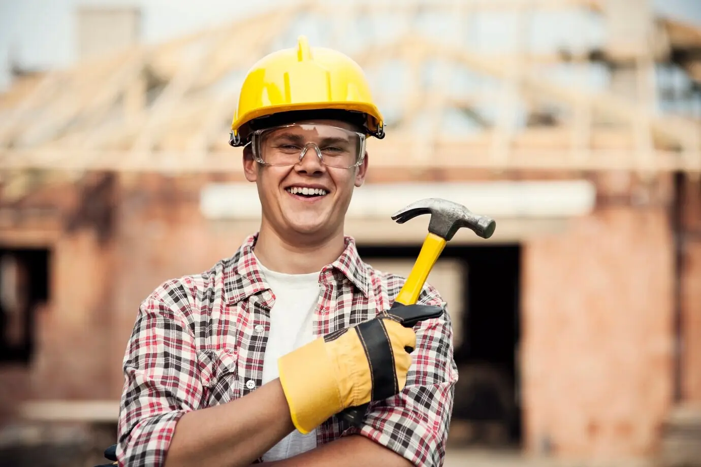 A construction worker with a hammer